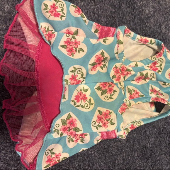 Floral dress tor dogs
Pink/teal blue/ and floral
Size small
Lightly used. - Picture 3 of 5